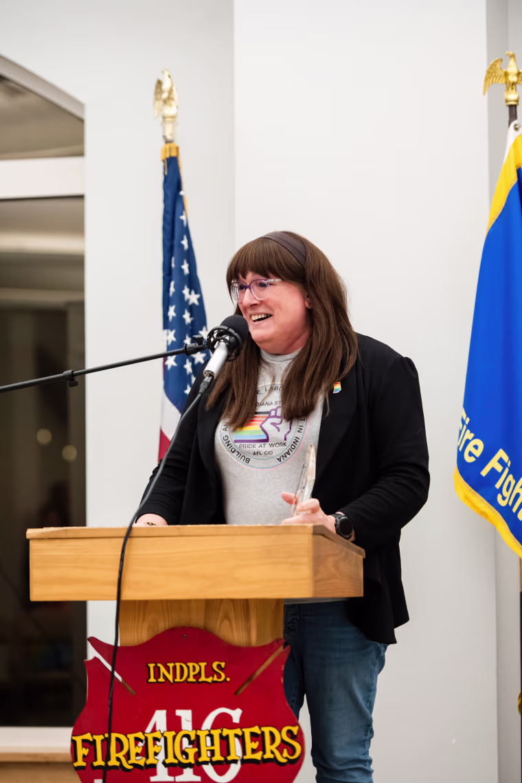 Veronica Pejril standing at lectern 