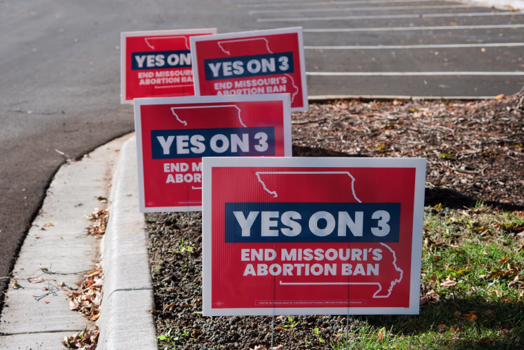 'Yes on 3' signs
