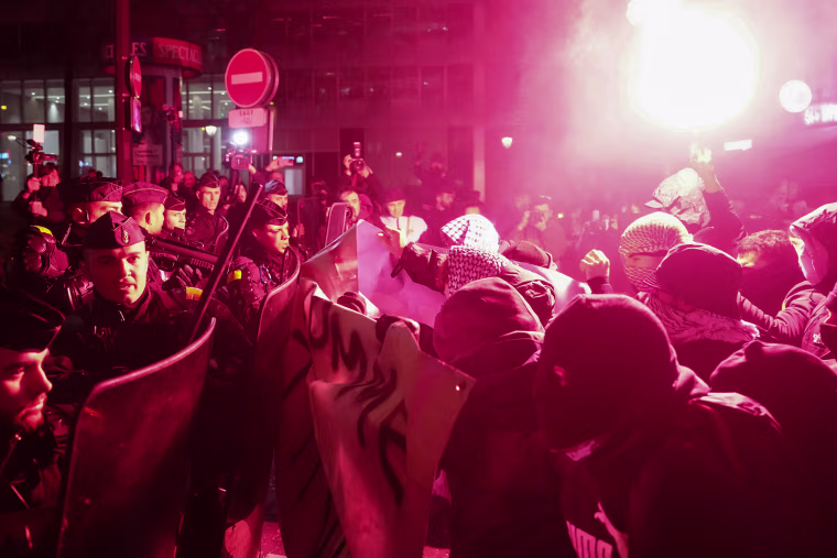 Protesters clash with French police.