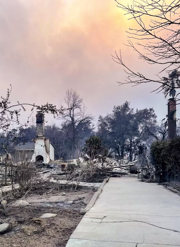 Only a charred chimney remains of Christina Conte's home in Altadena, Calif.