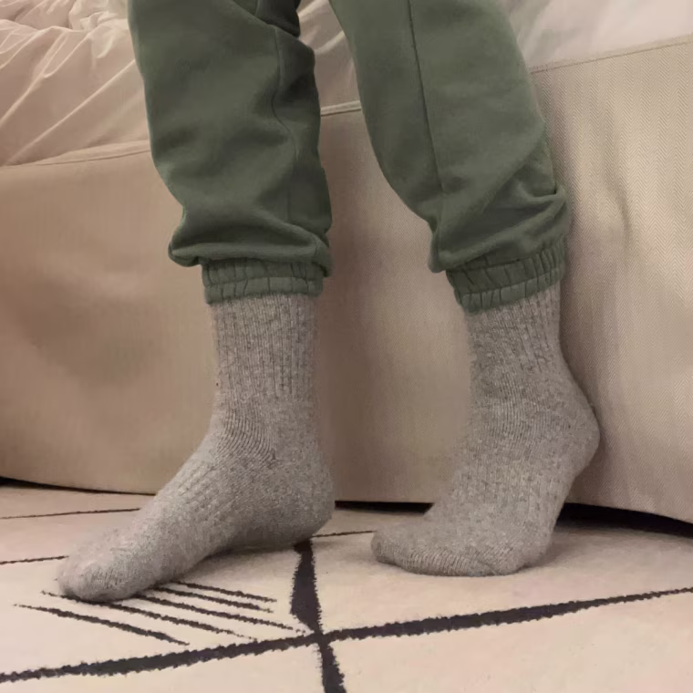 Commerce writer Danielle Murphy wearing the Ebmore Merino Wool Thermal Socks.