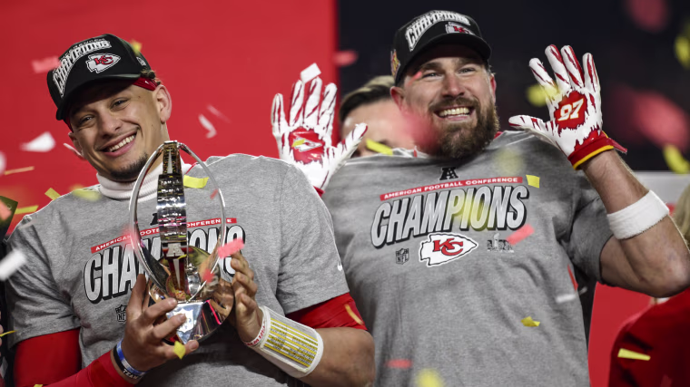 Kansas City Chiefs quarterback Patrick Mahomes and tight end Travis Kelce celebrate winning the AFC championship against the Buffalo Bills.