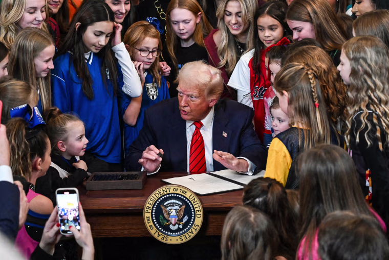Image: President Donald Trump signs the No Men in Women's Sports Executive Order into law
