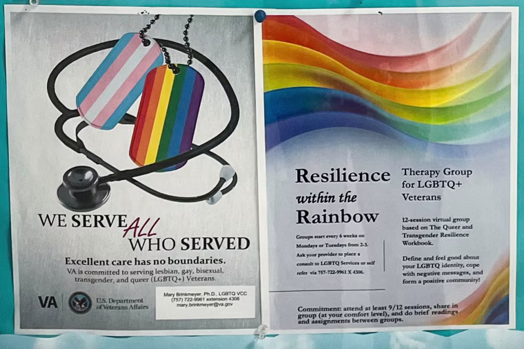 Pride flyers on display inside of a display box