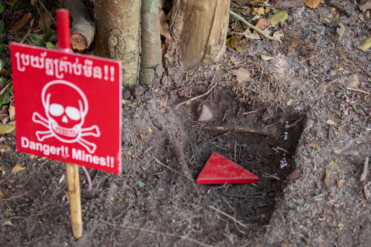 A Chinese-made "Bouncing Betty" landmine is detected by Cambodian Self Help Demining in Siem Reap.