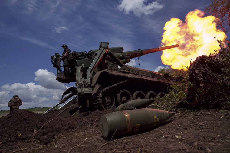 Ukrainian soldiers fire artillery toward Russian positions in the Donetsk region last year.