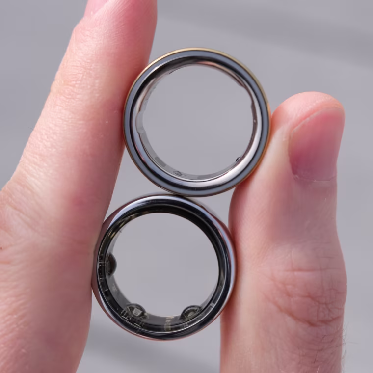 A close up image of the inside of the smooth Oura Ring 4 compared to the bumpy Oura Ring Gen 3.