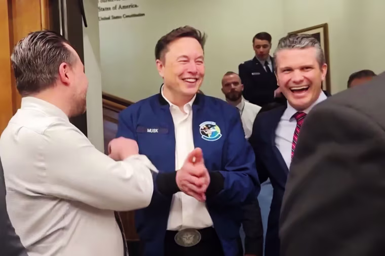 Elon Musk and Defense Secretary Pete Hegseth depart the Pentagon on March 21, 2025.