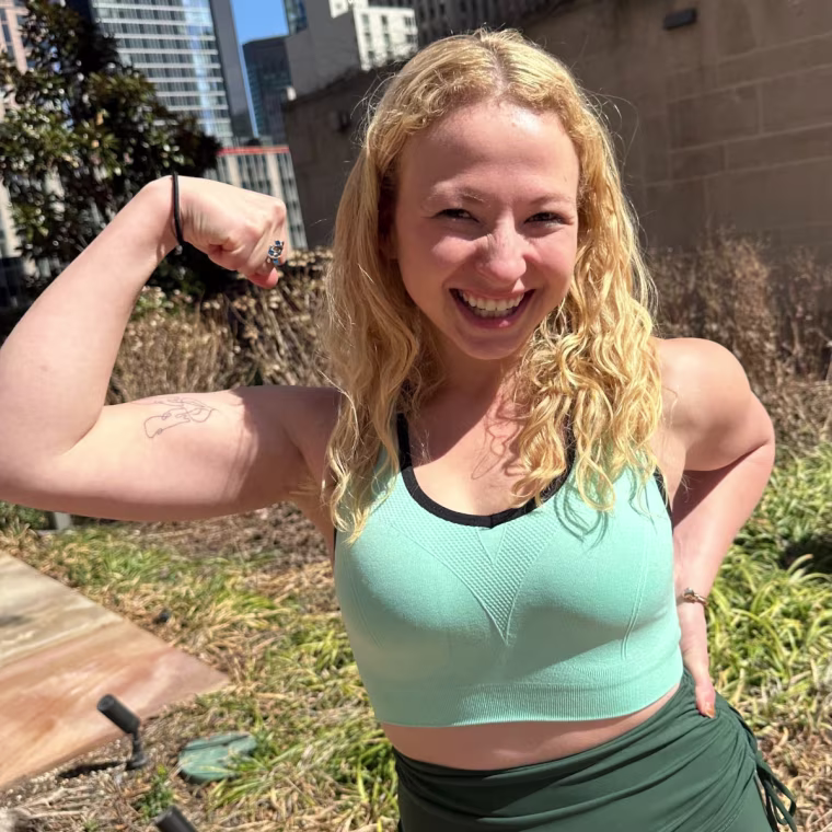 Producer Eden Strassburg tries the Racerback Sports Bra with Pads.