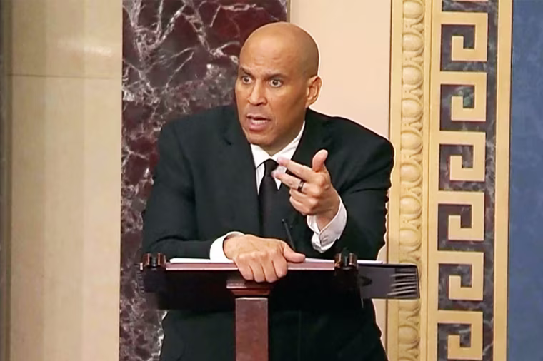 Sen. Cory Booker, D-N.J., speaks through the night on the Senate floor, criticizing President Donald Trump and Elon Musk.