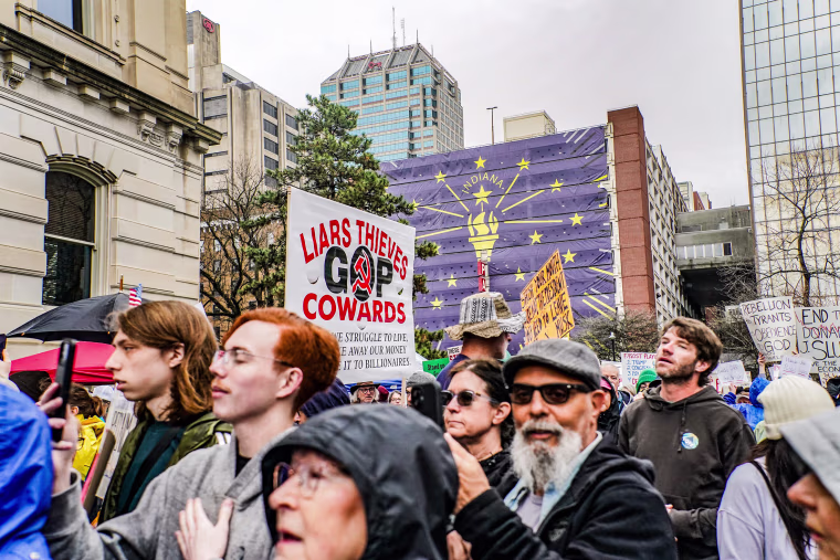 Hoosiers protest against federal cuts by President Donald Trump and Department of Government Efficiency head Elon Musk at the