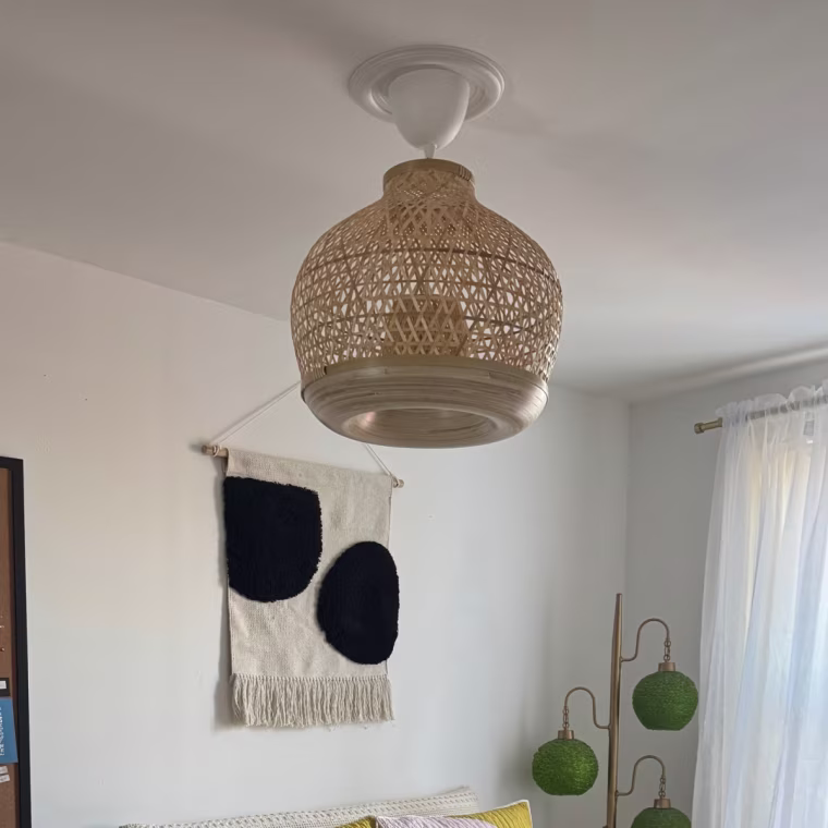 Ikea Misterhult pendant light attached to ceiling in a bedroom.