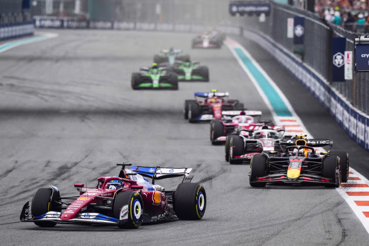 Racecars on a race track