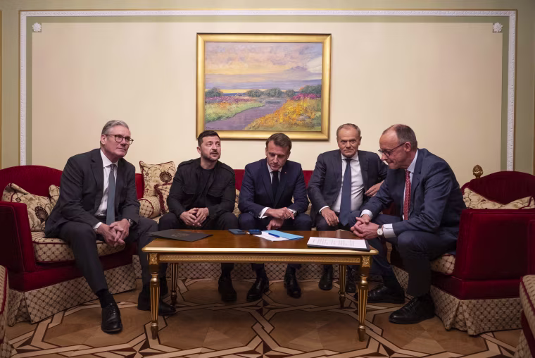 From left, British Prime Minister Keir Starmer, President Volodymyr Zelenskyy, French President Emmanuel Macron, Polish Prime Minister Donald Tusk and German Chancellor Friedrich Merz make a call to President Trump from Kyiv, Ukraine on May 10, 2025. 