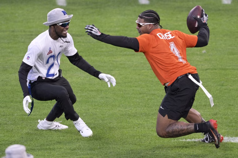 Ja’Marr Chase and Devon Witherspoon during a flag football event