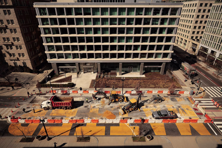 Crews use concrete saws, jackhammers and excavators as they continue to dismantle the Black Lives Matter Plaza street mural