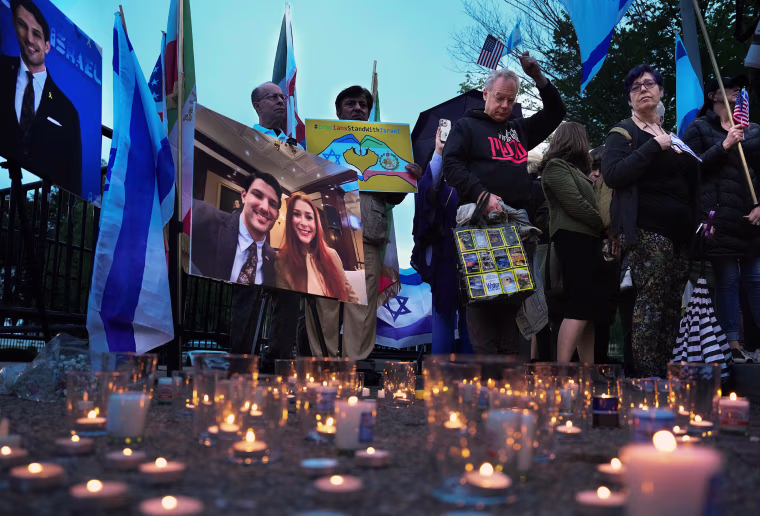 Mourners gather for a vigil 
