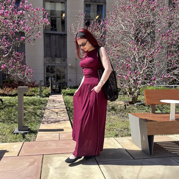 My go-to outfit for summer travel is this Halara Boat Neck Maxi Dress, which is easy to style with ballet flats, a mesh tote bag and a headband.