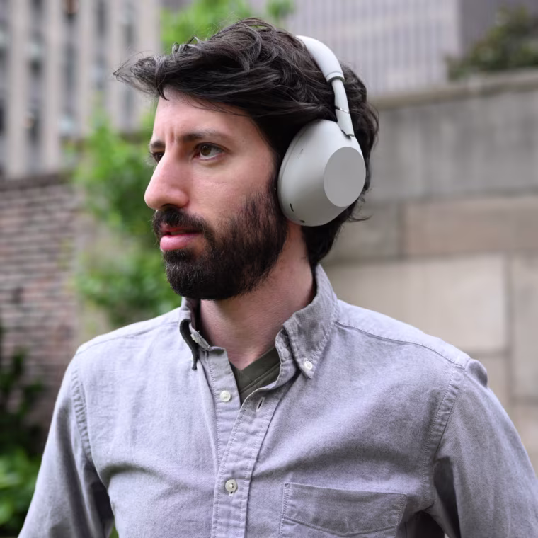 The Sony WH-1000XM6 headphones on the head of NBC Select reporter Harry Rabinowitz.