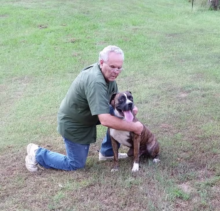 Foye Wade Davis and his dog, Buddy