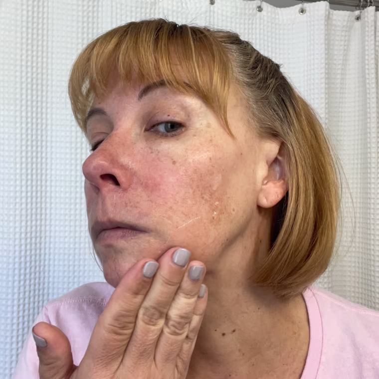 Edwards applying the SickScience ShapeShift V-Line Jaw Defining Serum.