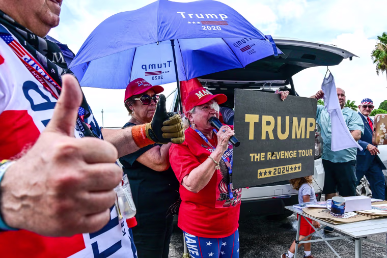 Donald Trump supporters prepare to start a caravan in Hialeah, Fla., on July 14, 2024.