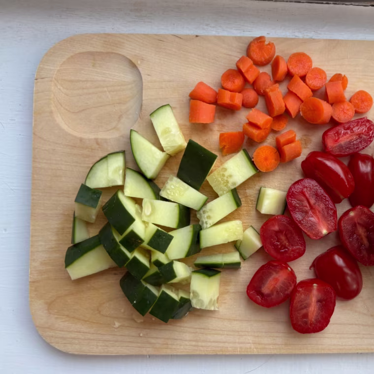 This cutting board’s small size is ideal for cutting vegetables for a salad, fruits like apples, a block of cheese or a bagel in half.