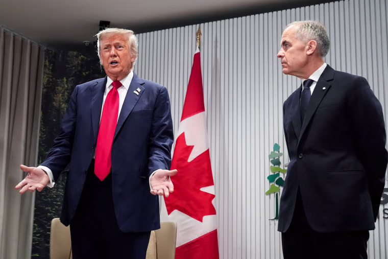 Donald Trump, left, and Mark Carney speak