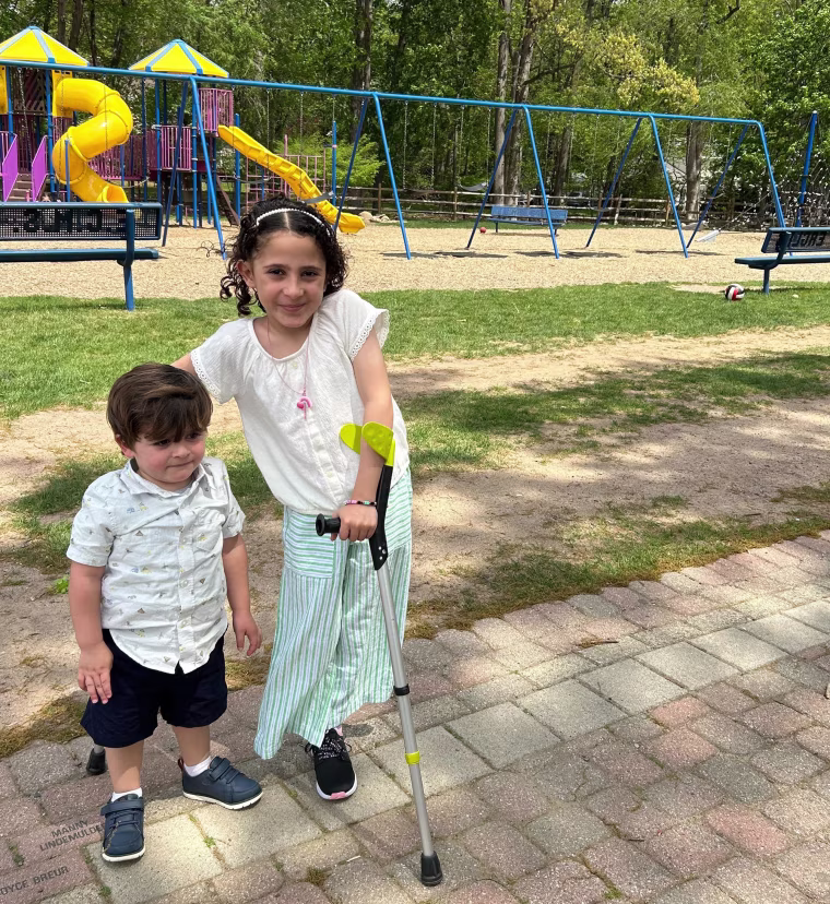 Qamar Alkordi with her brother.
