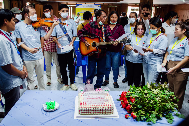 Members of the Overseas Irrawaddy Association (OIA) and blood donors are seen singing