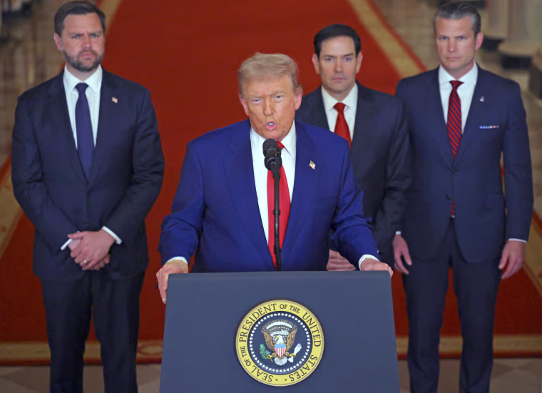 Trump addresses the nation from a lectern at the White House.