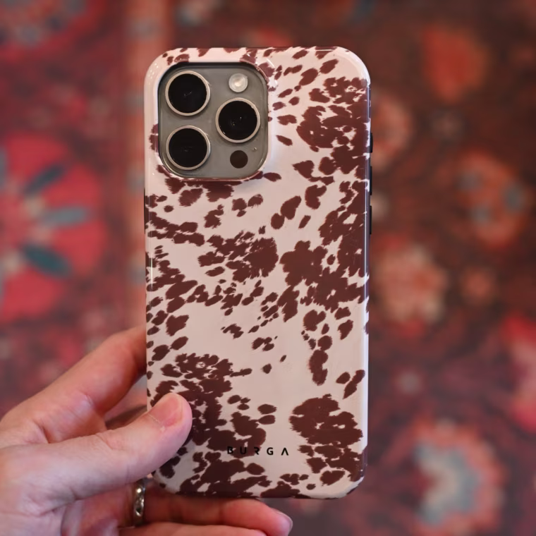 A close up of the Burga Tough Phone Case on an iPhone 15 Pro Max.
