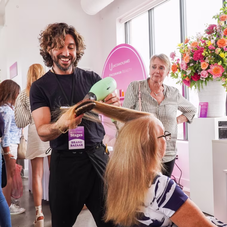 One guest receives a blowout from John Frieda.