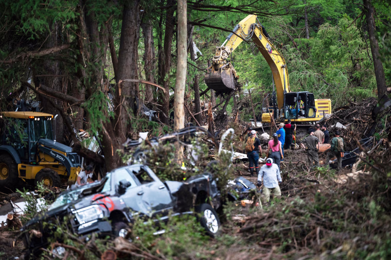 First responders carry out search and rescue operations