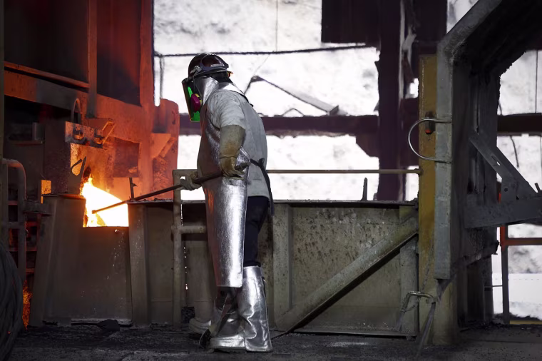 A man works with copper at El Teniente mine, the world's largest underground copper mine in Machali, near Rancagua, Chile on April 2, 2025.
