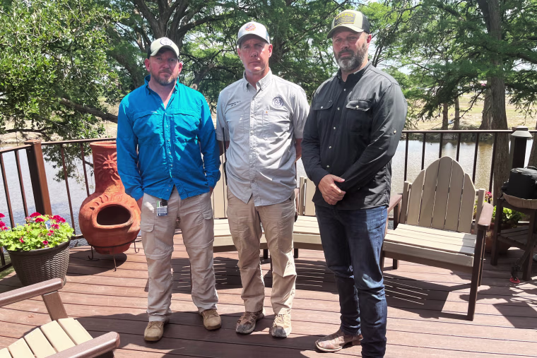 Dalton Rice, Jeff Holt, and Wes Virdell stand for a photo.