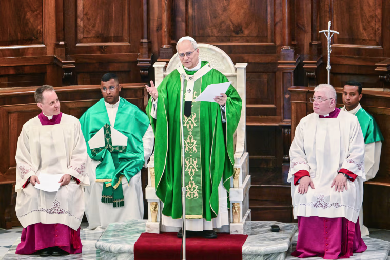 Pope Leo speaks inside of a church