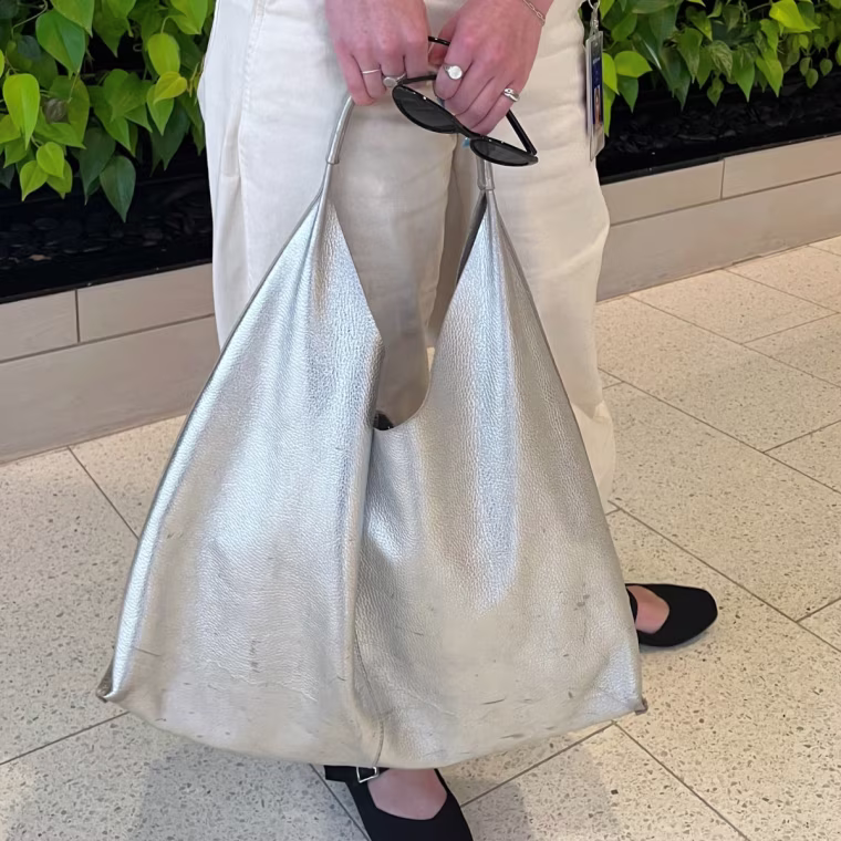 Production associate Audrey Ekman with the Marcella Kelly Tote.