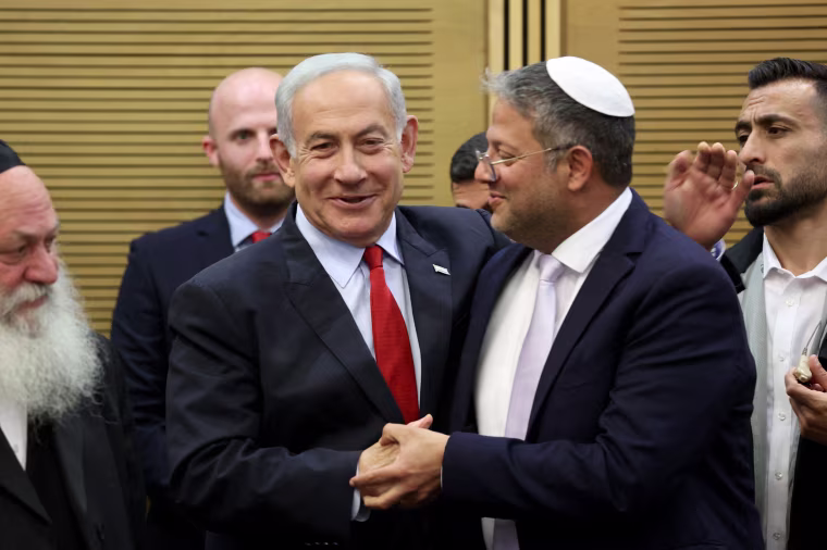 Benjamin Netanyahu and Itamar Ben-Gvir shake hands.