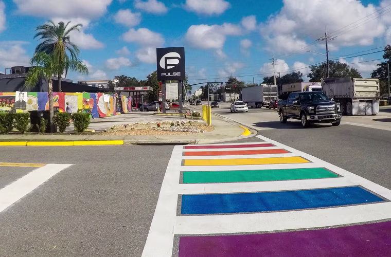 A rainbow crosswalk is installed on West Esther Street next to Pulse Nightclub