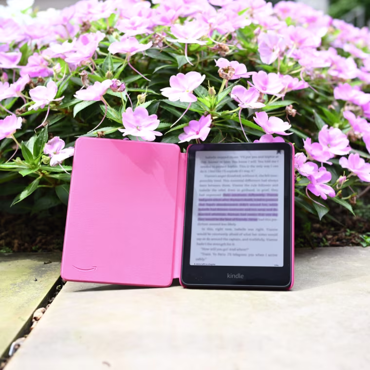 A close up image of a Kindle Colorsoft outdoors