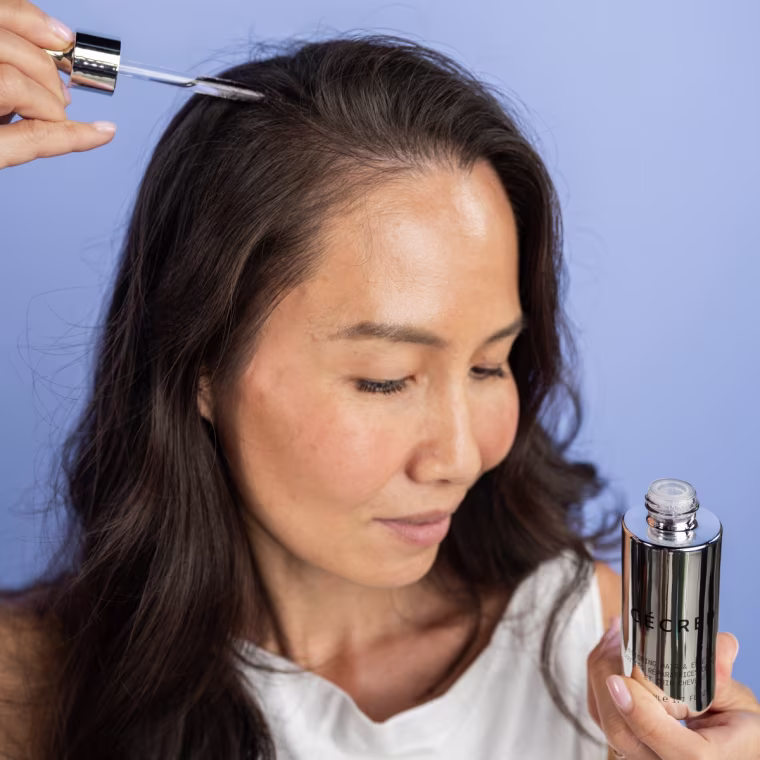 Applying Cécred Restoring Hair & Edge Drops