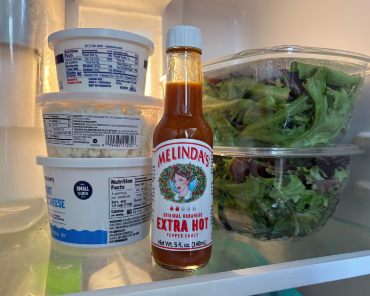 Melinda’s Original Habanero Extra Hot Sauce in the refrigerator.