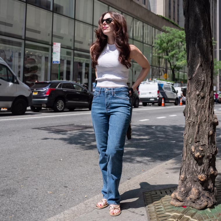 Associate editor Shannon Garlin wears the Old Navy Extra High-Waisted Straight Jeans in size 0.