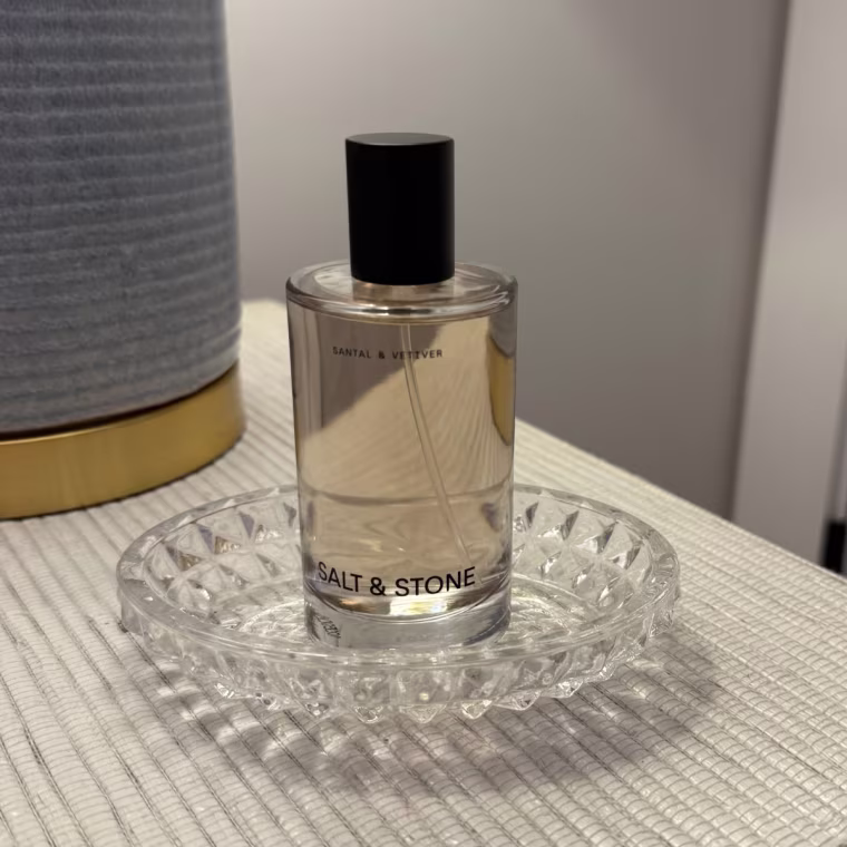 Salt and Stone’s body mist on a bedside table.