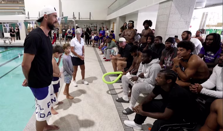 Michael Phelps teaches Ravens how to swim.
