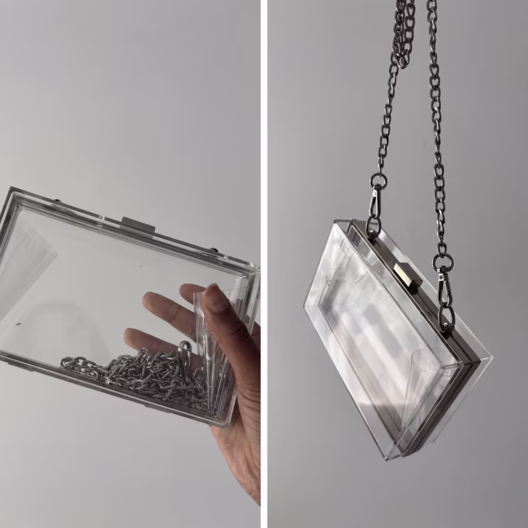 Two, side-by-side photos of the Sharplus Clear Clutch held in-hand with the chain tucked inside (left) and held dangling by the chain (right).