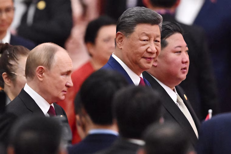 Putin Xi Kim in China