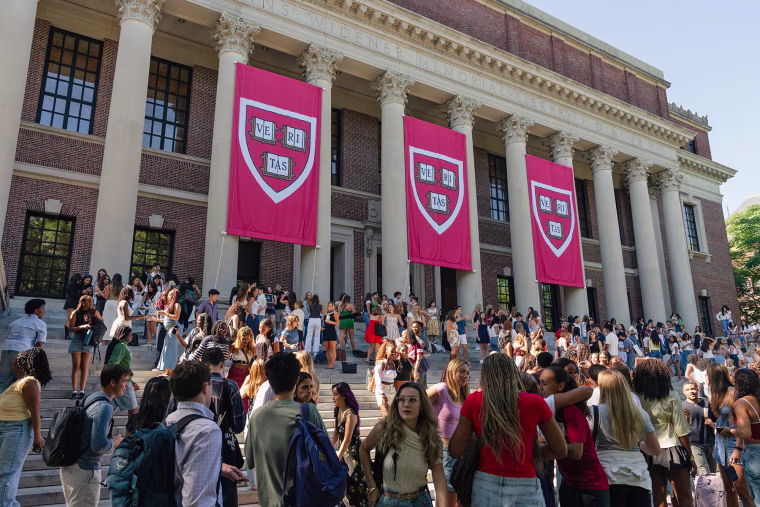 Students gather in front of the Widener Library on the first day of classes at Harvard University.