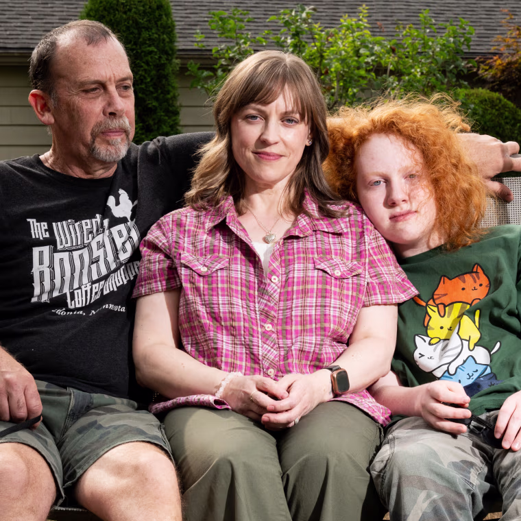 Leighanne Safford, center, with her husband, Lorry, and son, Adam. The Saffords' insurance premiums could jump in January after enhanced subsidies expire.